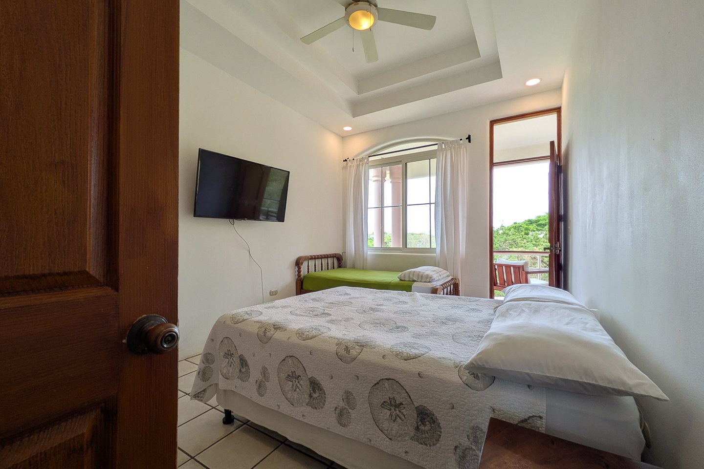 san-juan-del-sur-end-unit-condo-primary-bedroom-balcony-access