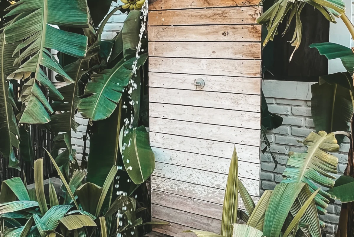 Tropical outdoor shower at Monoloko Lodge bungalows near Playa Santana, Popoyo, Nicaragua