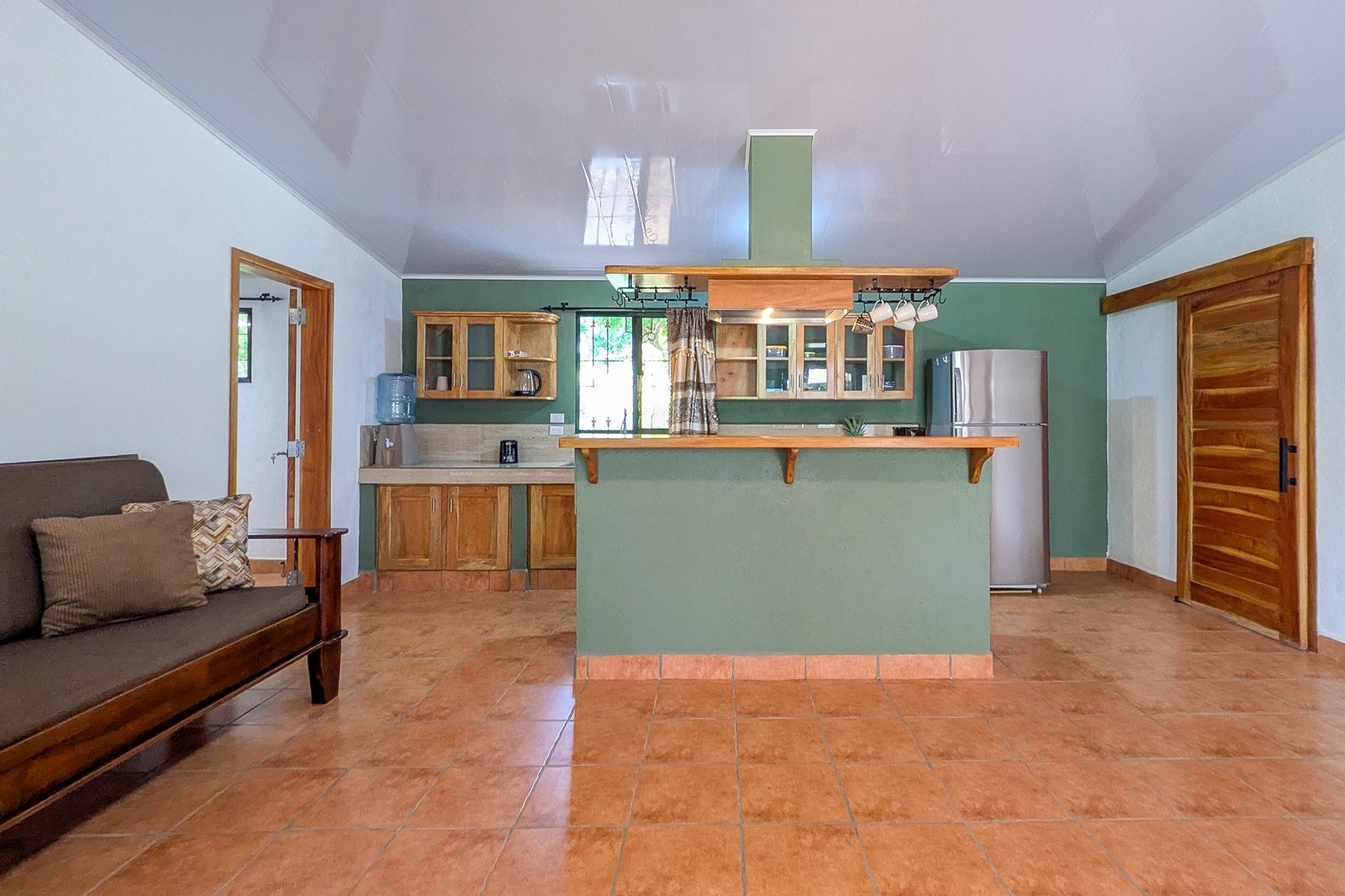 Open concept kitchen with solid wood cabinetry