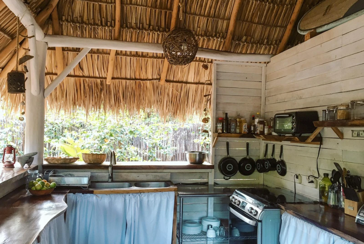 Shared kitchen and dining area at Monoloko Lodge boutique surf lodge, Nicaragua