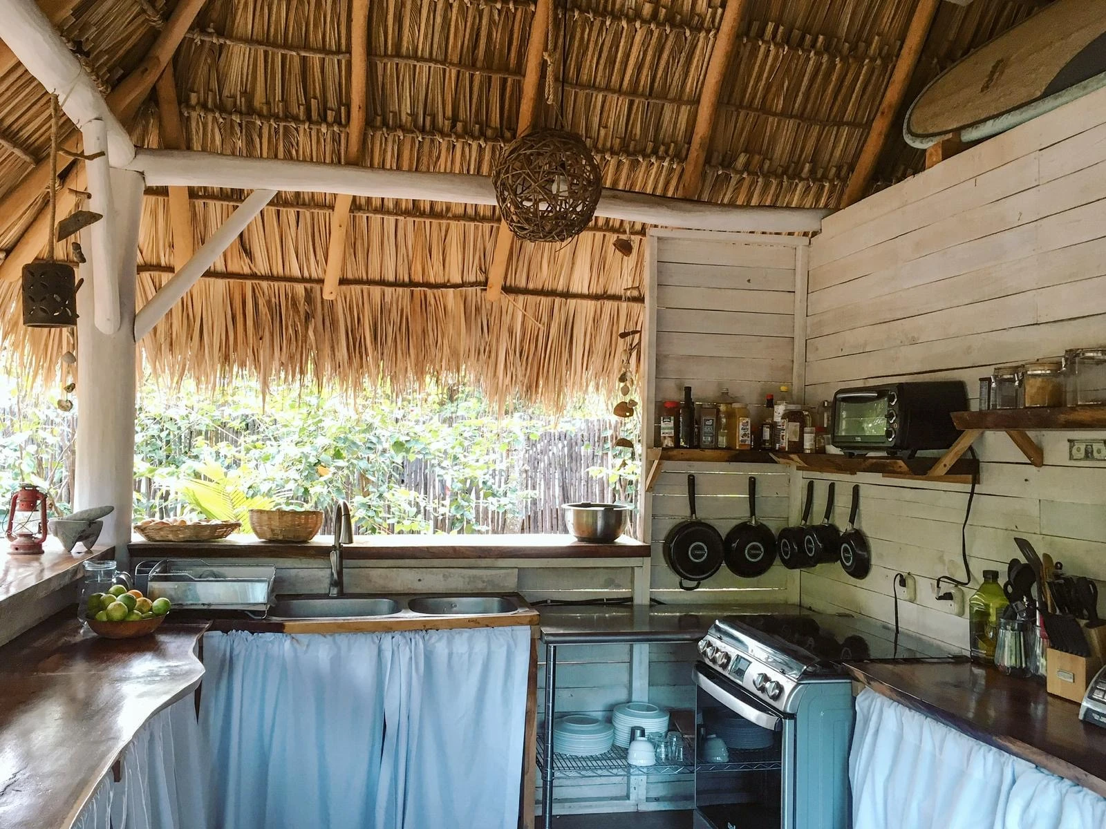 Shared kitchen and dining area at Monoloko Lodge boutique surf lodge, Nicaragua