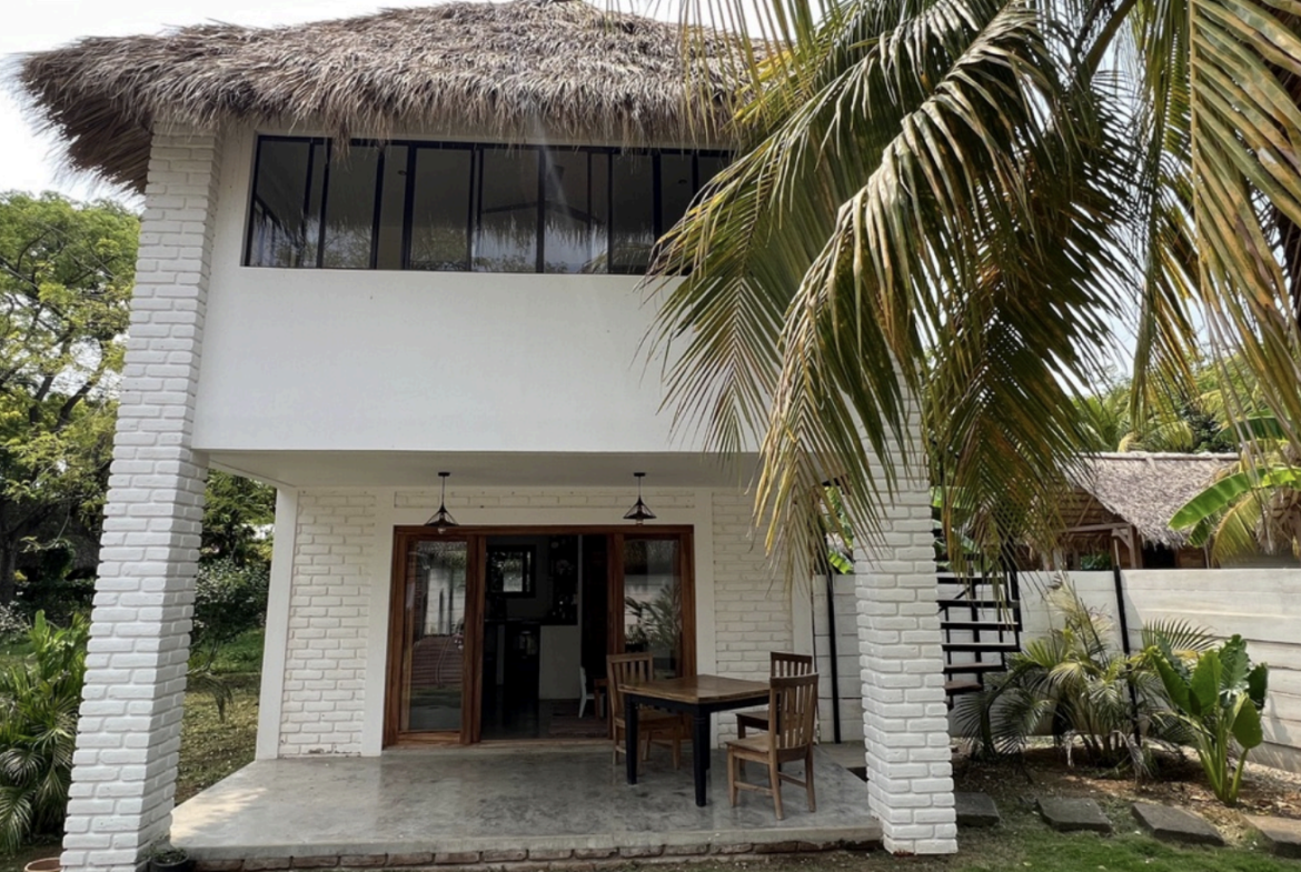 Two-story manager's house at Monoloko Lodge, an operating surf lodge for sale in Popoyo, Tola, Nicaragua