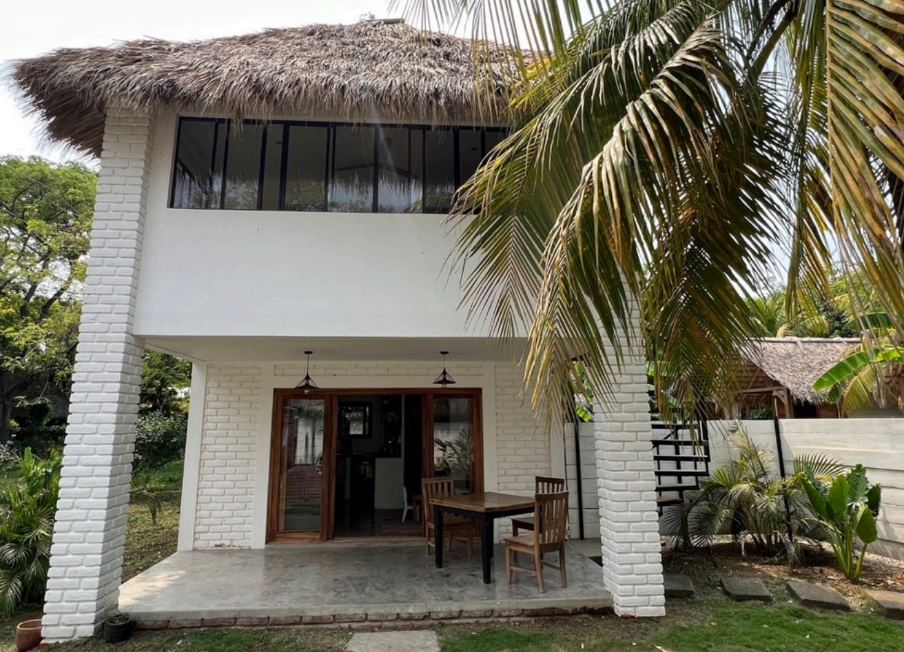 Two-story manager's house at Monoloko Lodge, an operating surf lodge for sale in Popoyo, Tola, Nicaragua