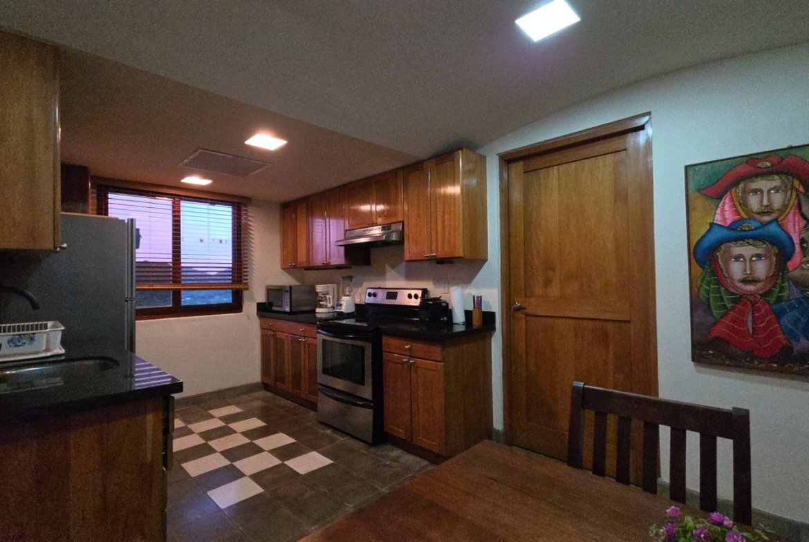 Fully equipped kitchen in a home for sale at Villas de Palermo, San Juan del Sur