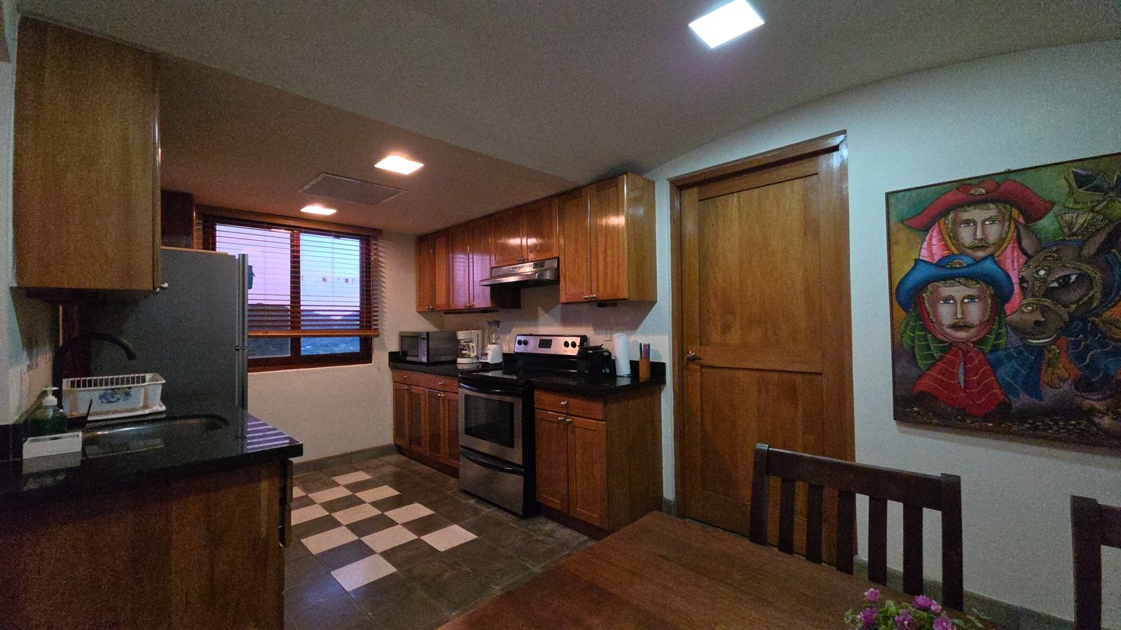 Fully equipped kitchen in a home for sale at Villas de Palermo, San Juan del Sur