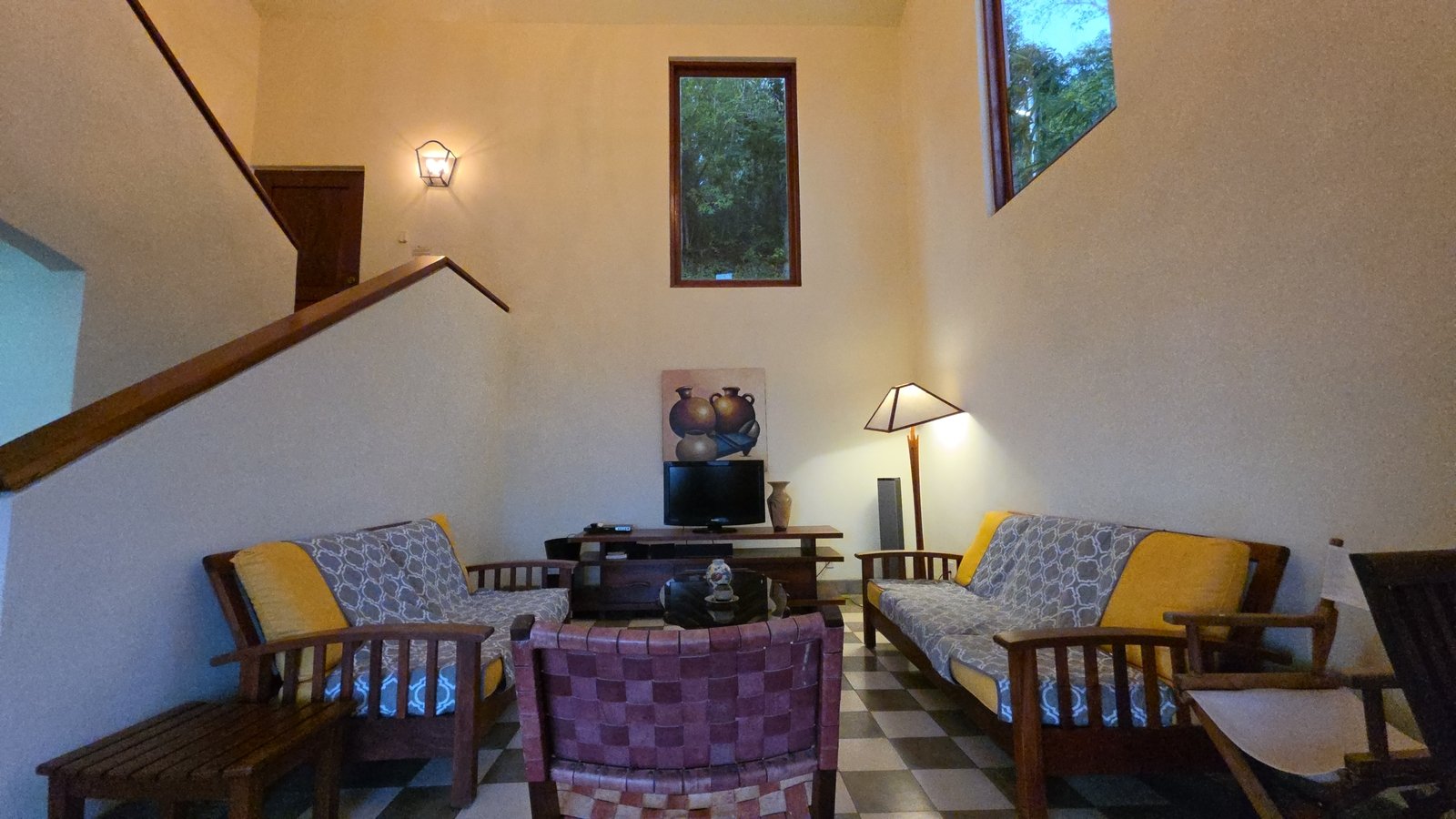 Open living area with comfortable seating at Villas de Palermo, San Juan del Sur, Nicaragua