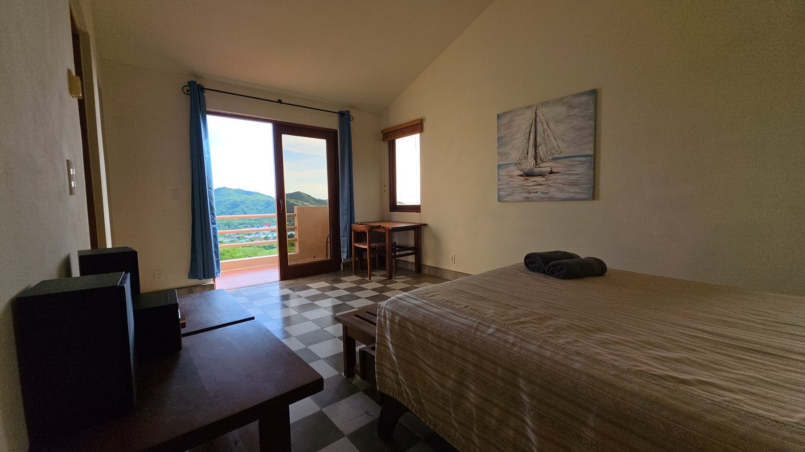 Master bedroom with private terrace access at Villas de Palermo, San Juan del Sur