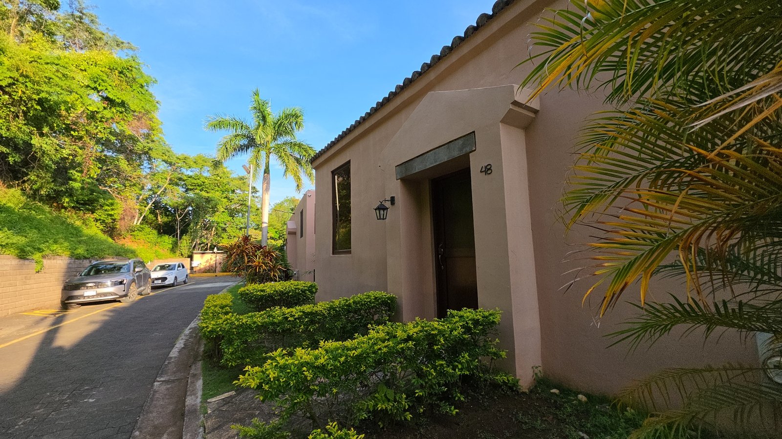 Shared parking area for residents and guests at Villas de Palermo, Nicaragua