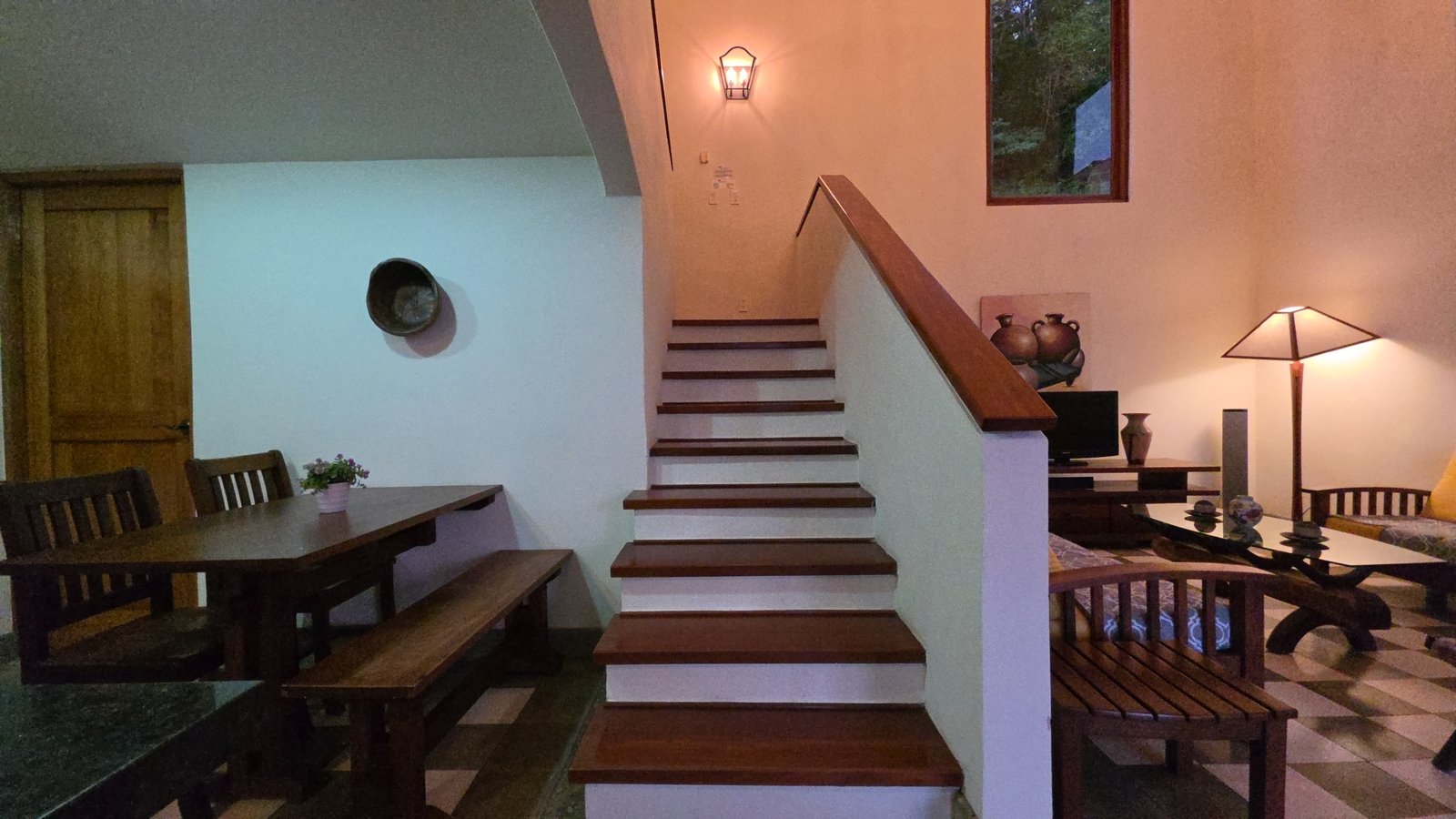 Upper staircase leading to the second floor in a home at Villas de Palermo, San Juan del Sur